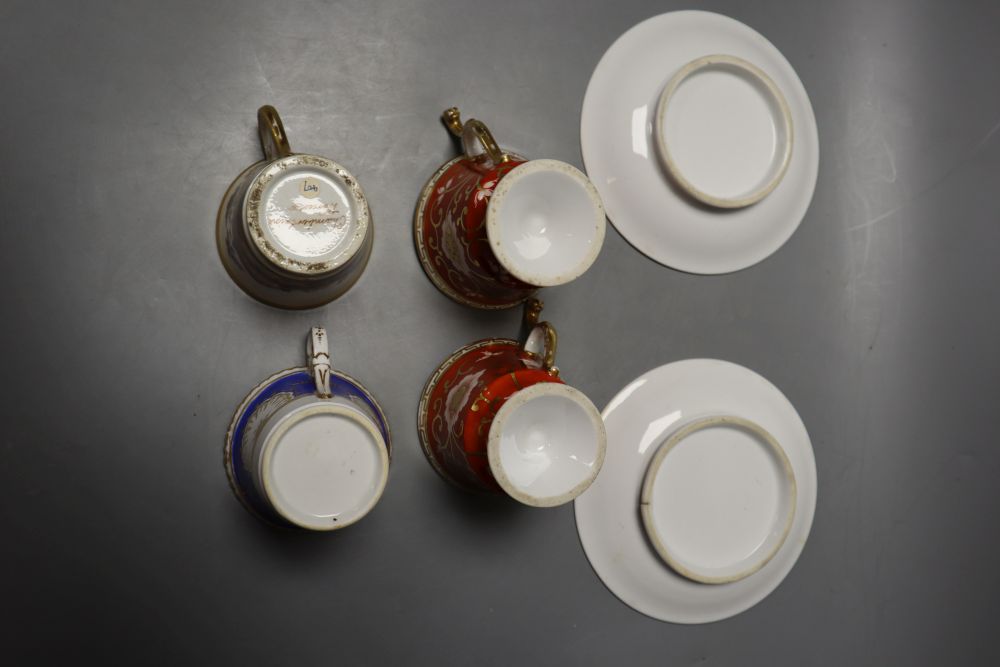 A pair of Chamberlain rare shaped cups and saucer, the handle with animal heads and two Chamberlain coffee cups, one with landscape and